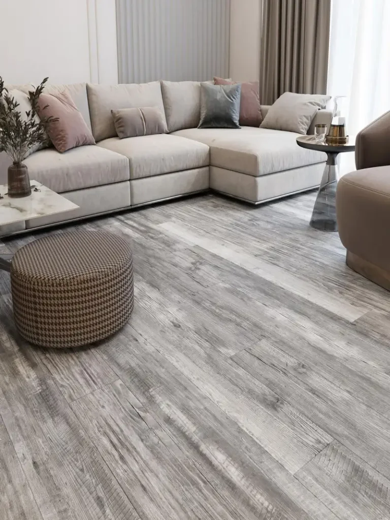Modern living room with light grey wood-look SPC flooring Dubai