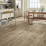 SPC flooring with light wood look in a Dubai kitchen